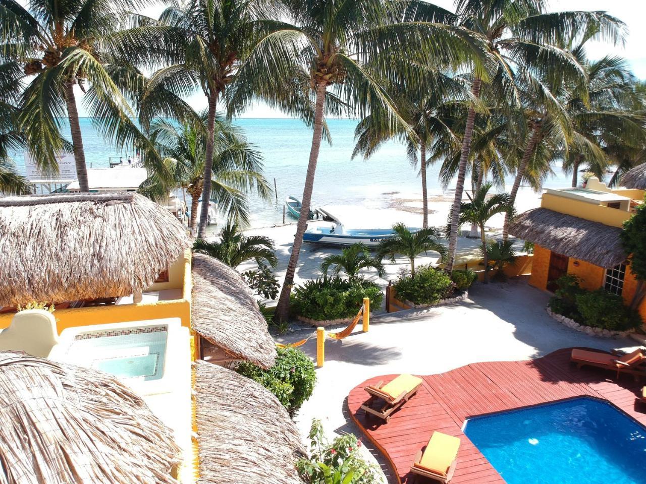 Seaside Cabanas Hotel Caye Corker Exterior photo