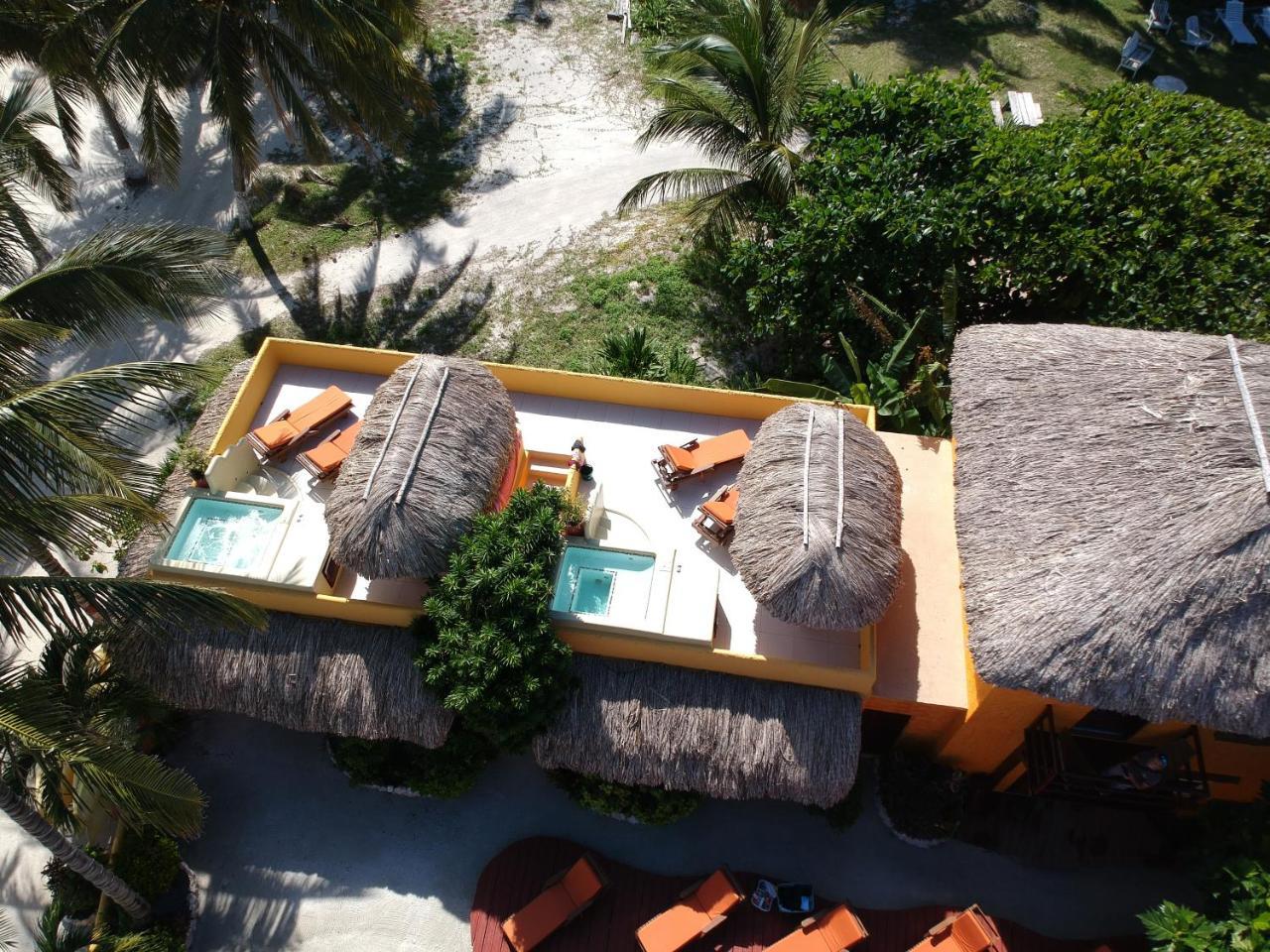 Seaside Cabanas Hotel Caye Corker Exterior photo