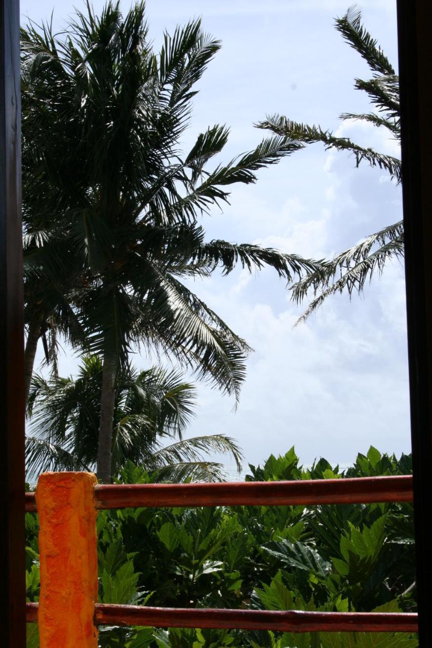 Seaside Cabanas Hotel Caye Corker Exterior photo